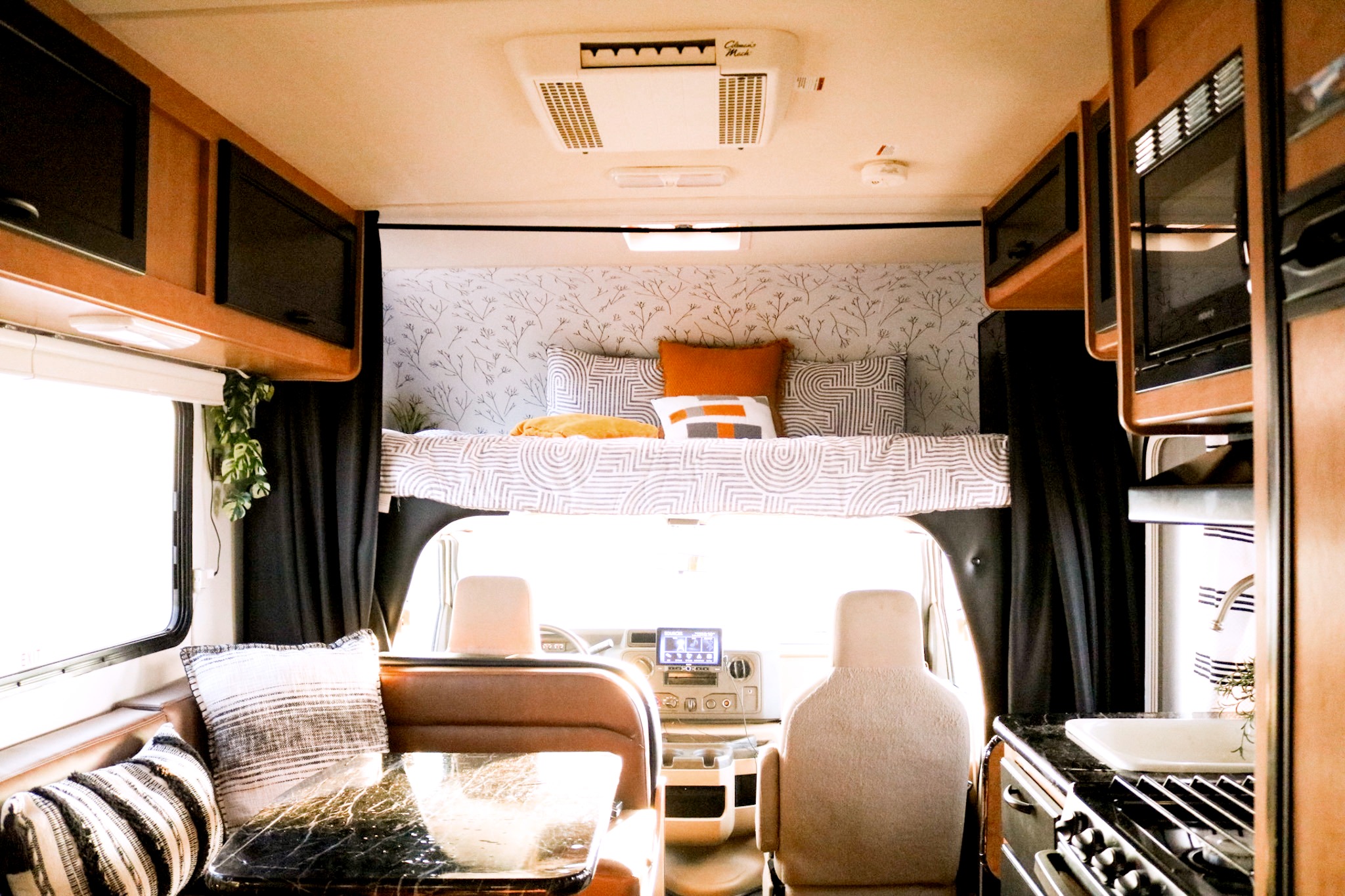 Boho-Chic Haven on Wheels: Exquisite 2015 Thor Motor Coach Freedom Elite 22