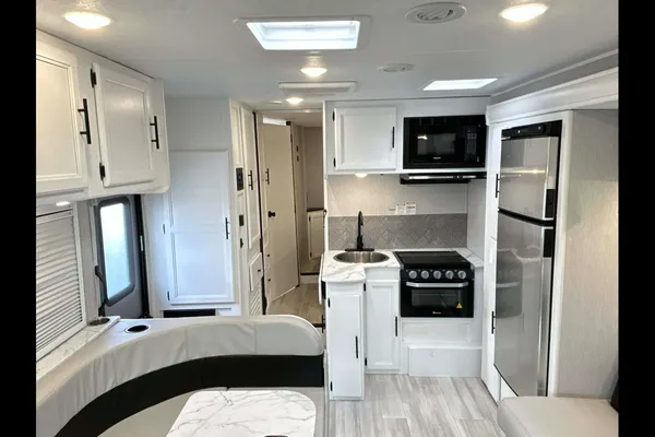 The Modern Family Suite Basecamp Coachmen Cross Trail 26XG Class C Godzilla Engine V8
