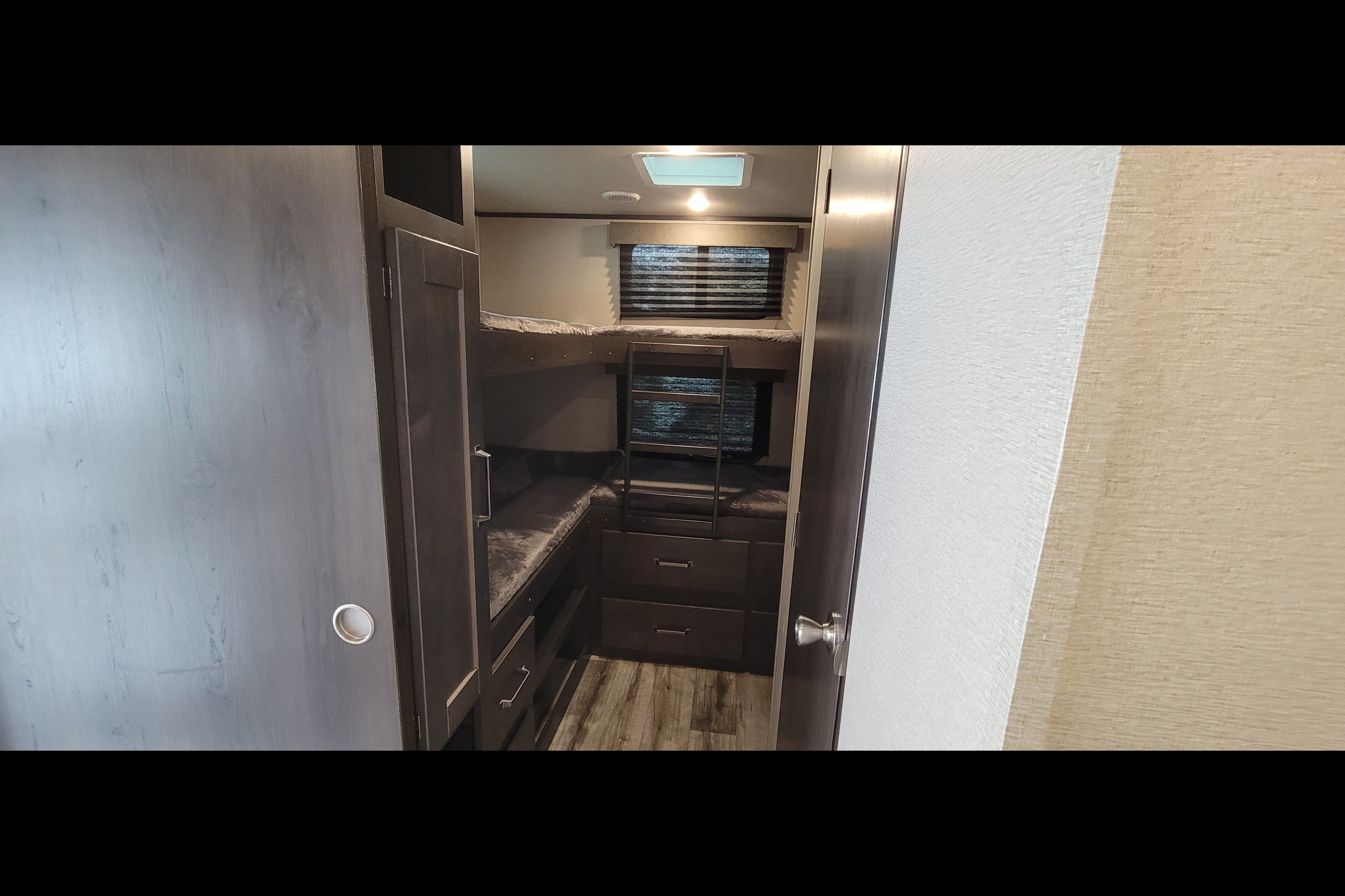 The Dual-Suite Retreat The Ultimate Family Bunkhouse Grand Design 321BH Travel Trailer