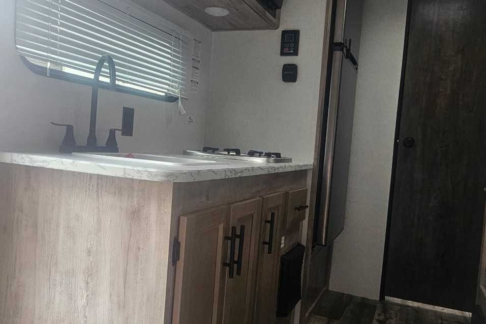 The Burger Grand River 199DD Travel Trailer