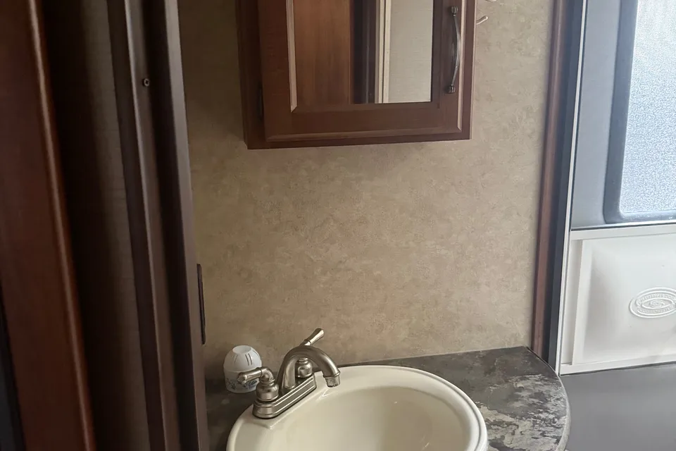 Laura's cozy Keystone Cougar Travel Trailer
