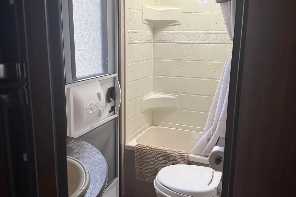 Laura's cozy Keystone Cougar Travel Trailer