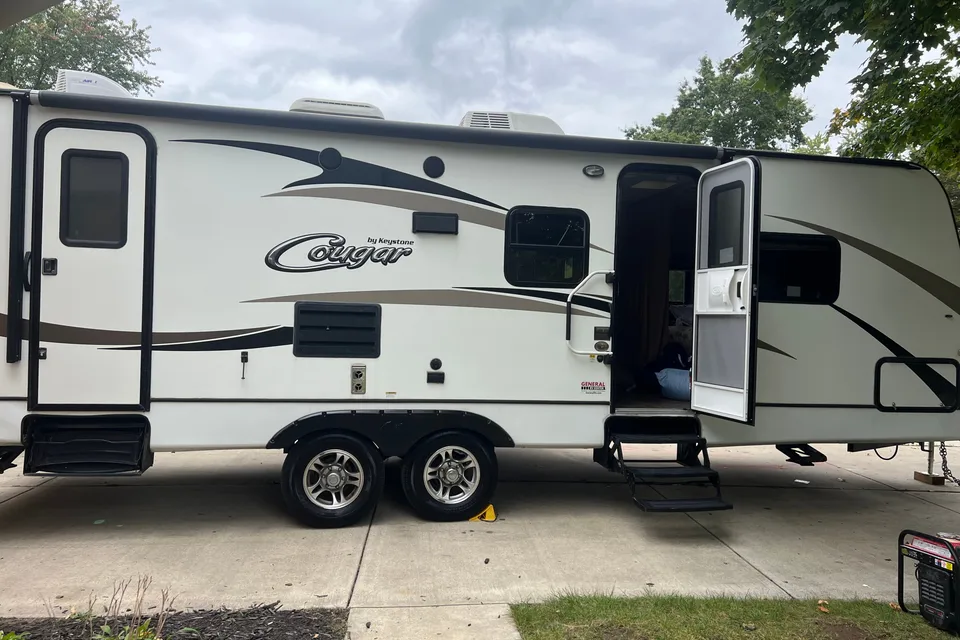 Laura's cozy Keystone Cougar Travel Trailer