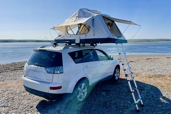Olly the Outlander and Theo the Thule Popup Tent
