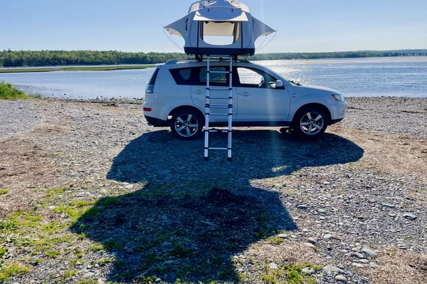 Olly the Outlander and Theo the Thule Popup Tent