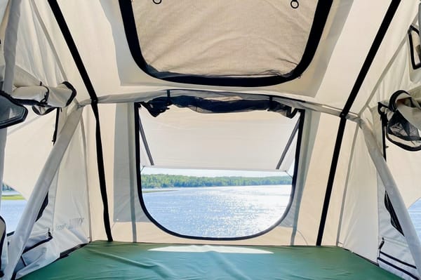 Olly the Outlander and Theo the Thule Popup Tent