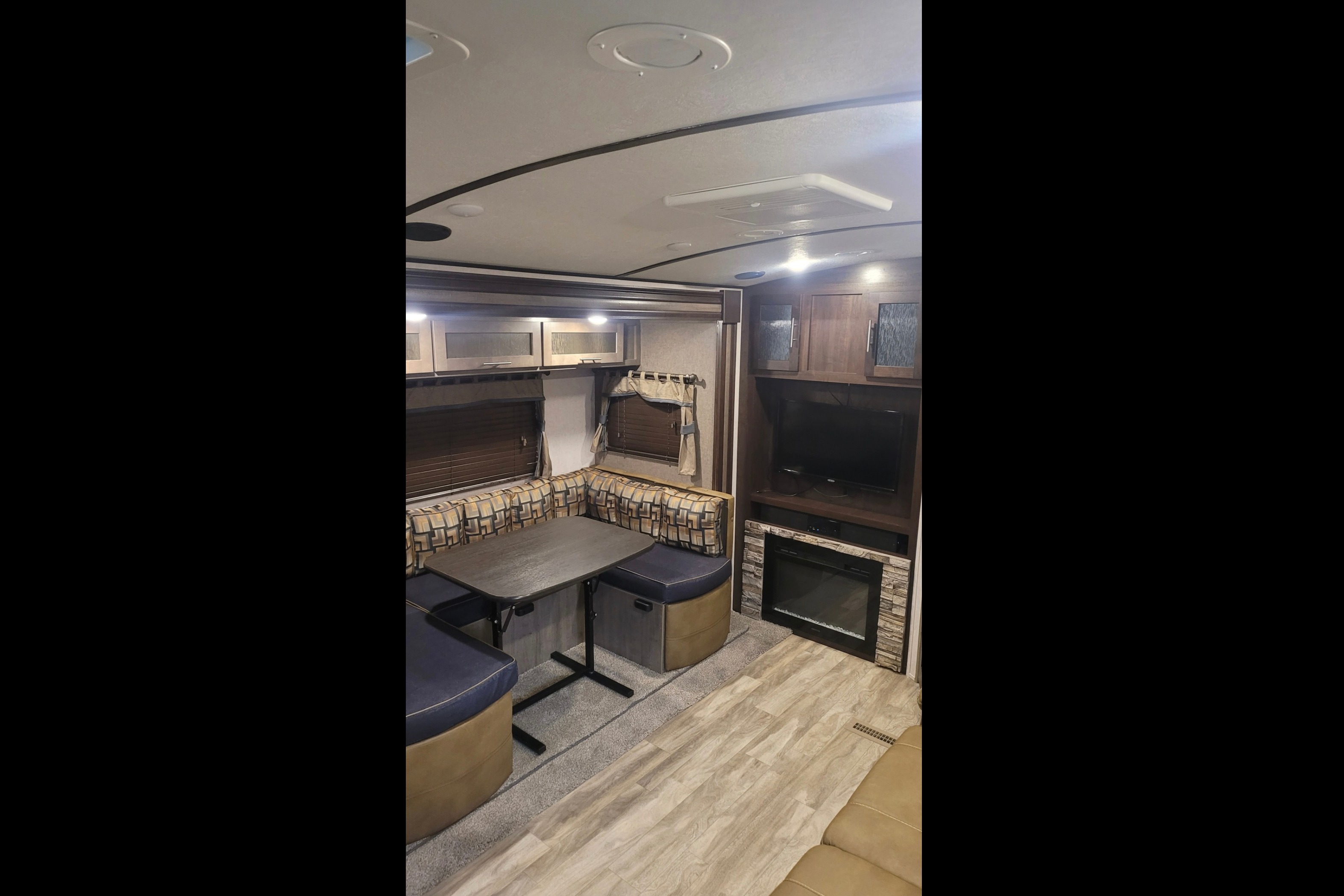 Kim & Scott's Cozy Camper (Forest River Surveyor)