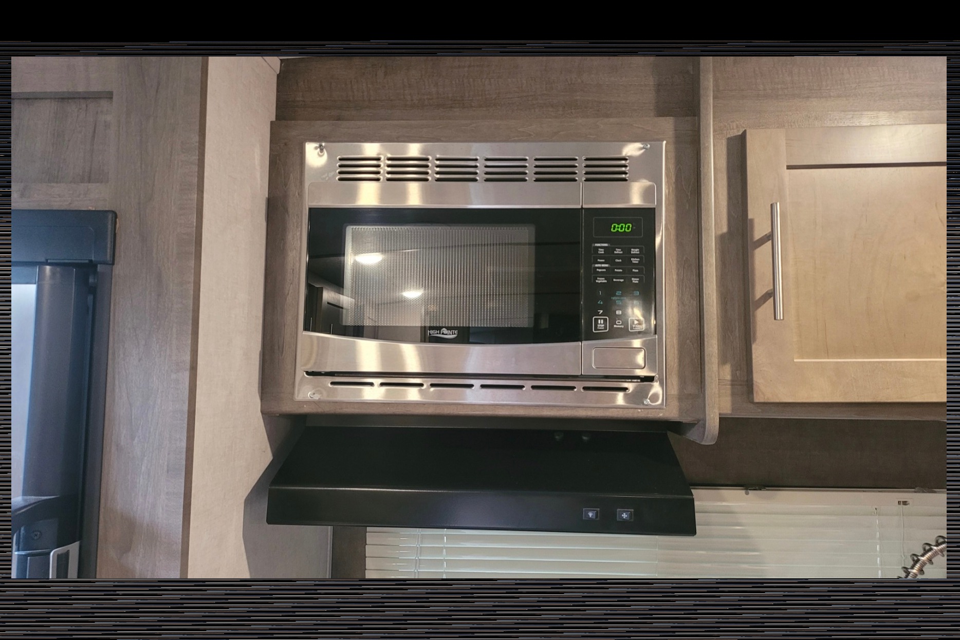 Kim & Scott's Cozy Camper (Forest River Surveyor)