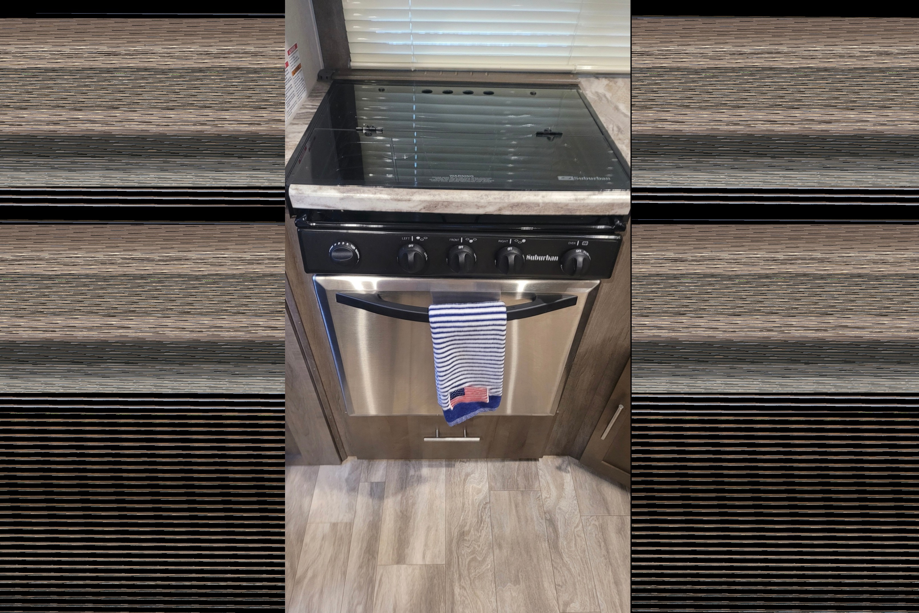 Kim & Scott's Cozy Camper (Forest River Surveyor)