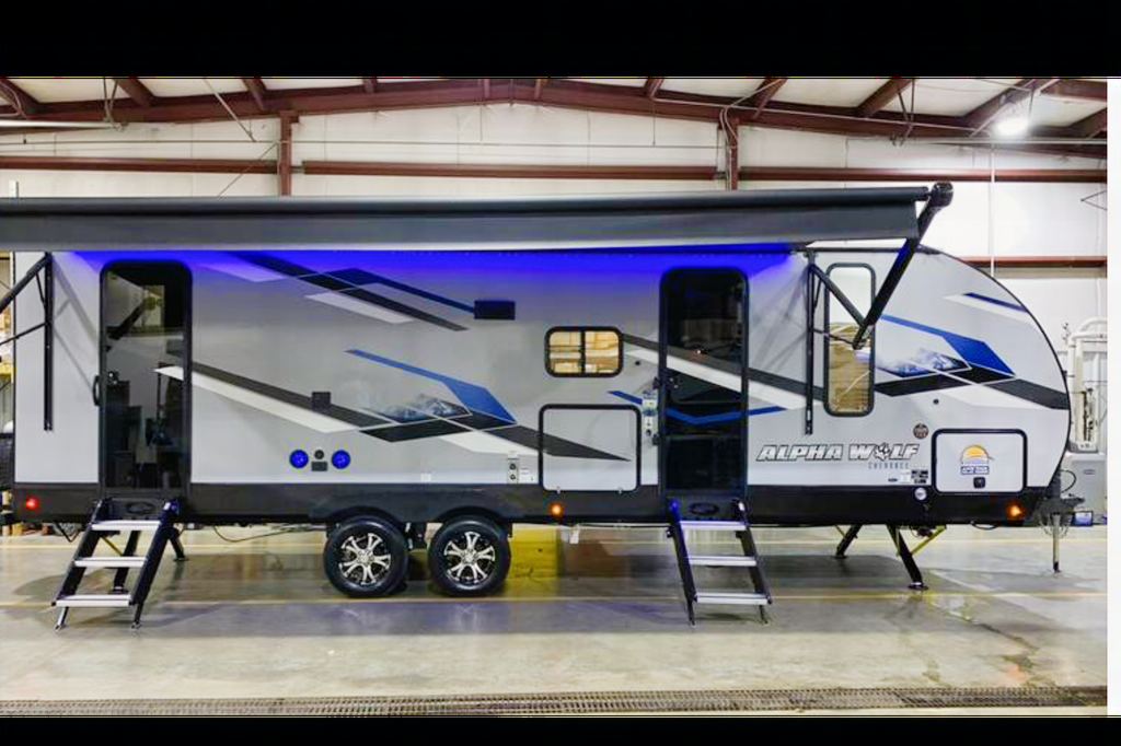 The Berger family Forest River Alpha wolf Travel Trailer