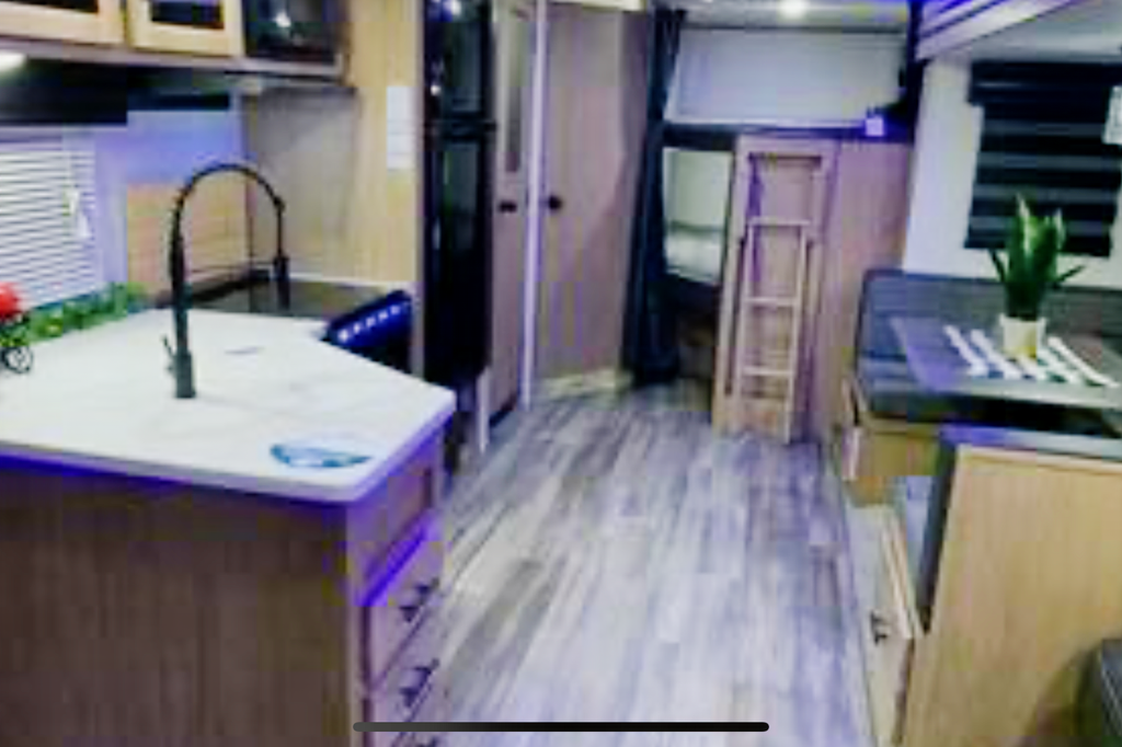 The Berger family Forest River Alpha wolf Travel Trailer