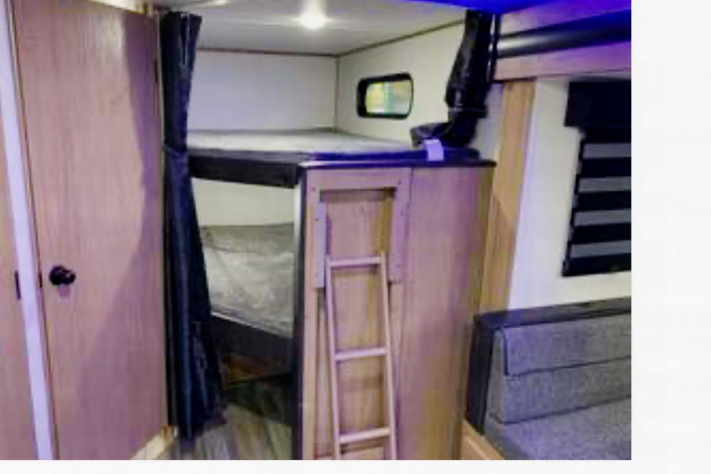 The Berger family Forest River Alpha wolf Travel Trailer