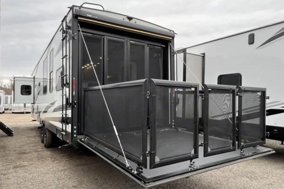 Reyes Family Grand Design Momentum 32G Toy Hauler