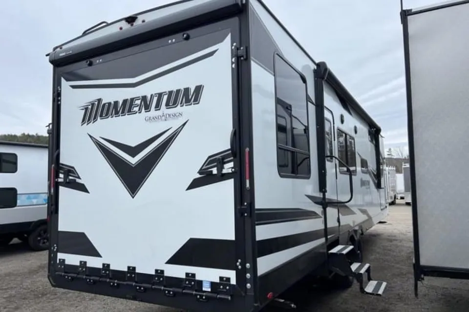 Reyes Family Grand Design Momentum 32G Toy Hauler