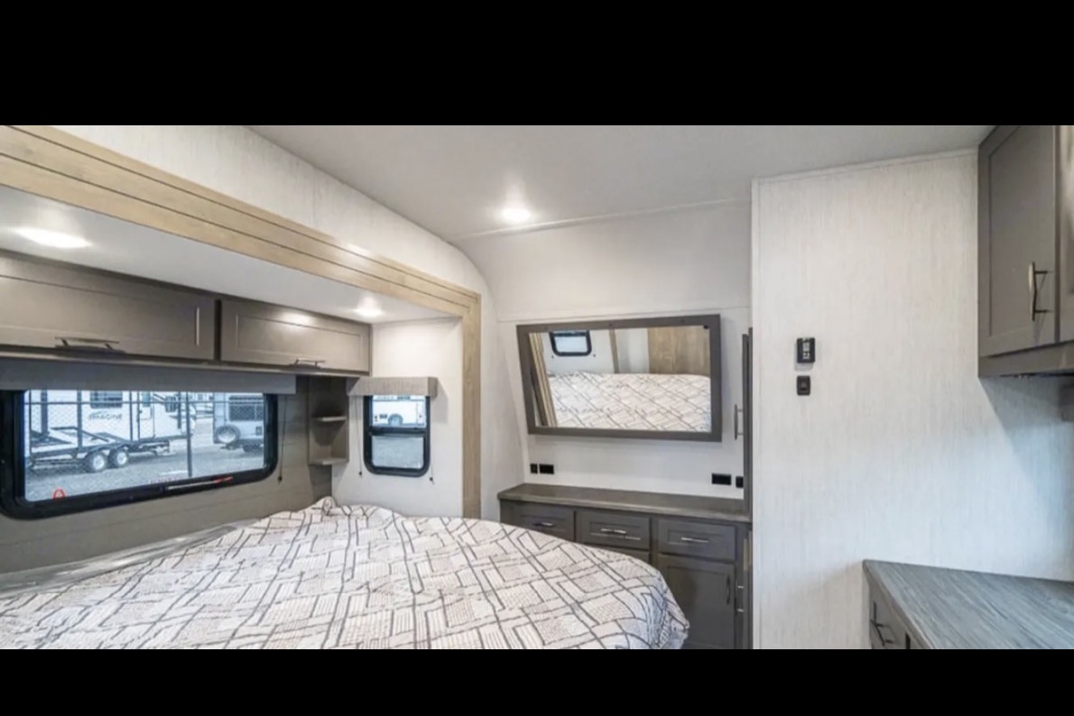 Reyes Family Grand Design Momentum 32G Toy Hauler