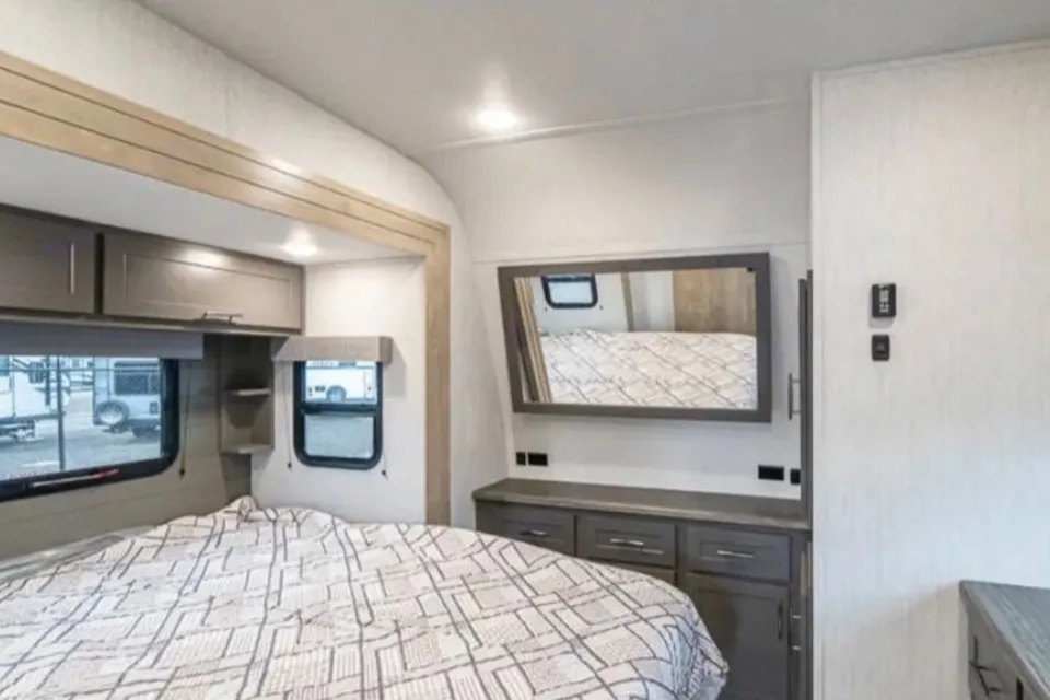 Reyes Family Grand Design Momentum 32G Toy Hauler