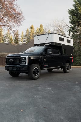 Raptor Rooftop Rentals Ford F-350 Ultimate Tremor with 4 Wheel Truck Camper
