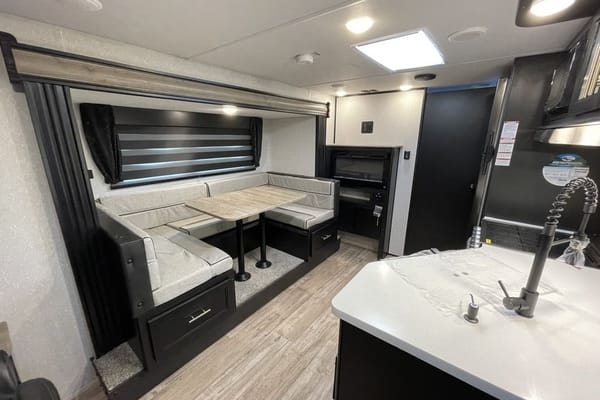 “Monique” - New 2022 Forest River Grey Wolf 23 MKBL Black Label
