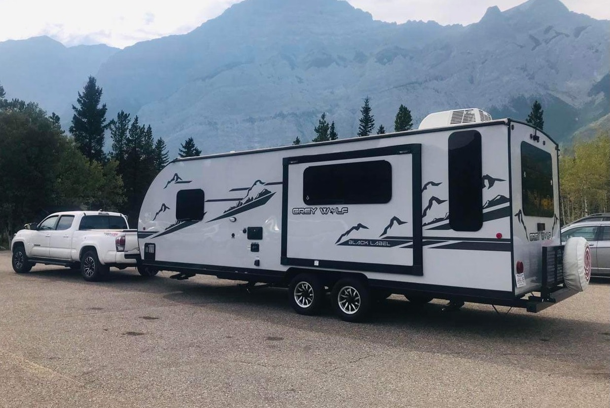 “Monique” - New 2022 Forest River Grey Wolf 23 MKBL Black Label