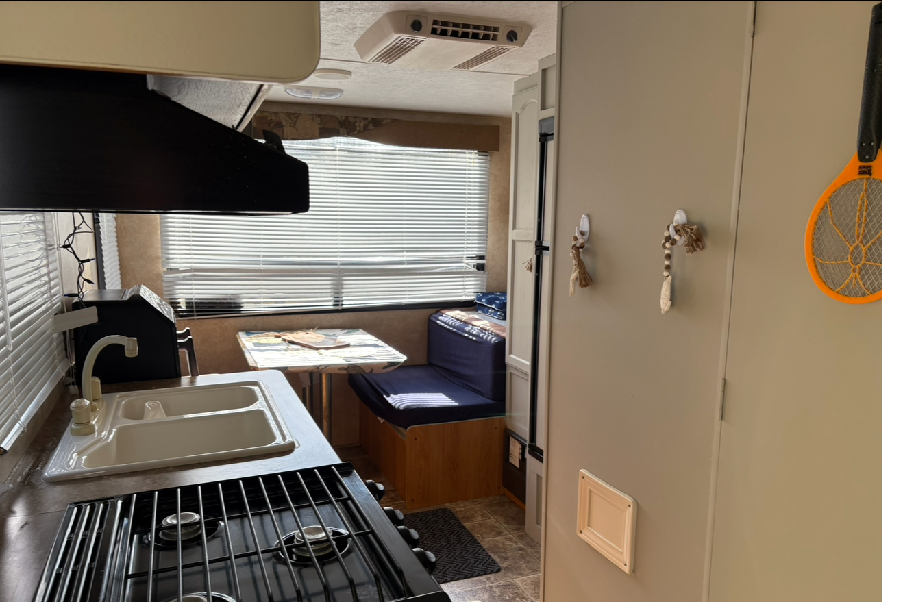 Charla's one of a kind Keystone SM1 Travel Trailer