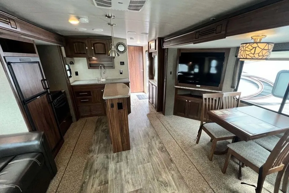 Leslie’s Happy Camper Heartland Trailside Travel Trailer