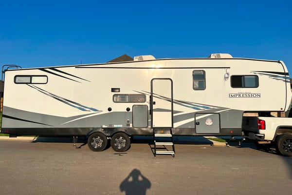 James's Forest River Impression Fifth Wheel