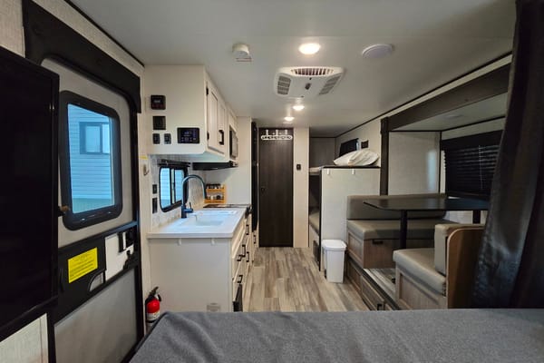 Ryan and Natashas Highland Ridge RV Open range 180 bhs Travel Trailer