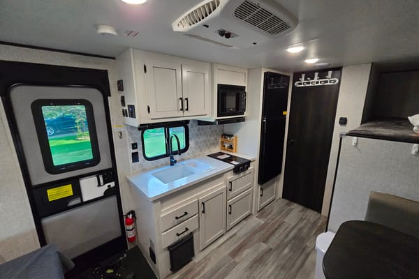 Ryan and Natashas Highland Ridge RV Open range 180 bhs Travel Trailer