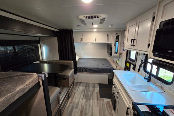 Ryan and Natashas Highland Ridge RV Open range 180 bhs Travel Trailer