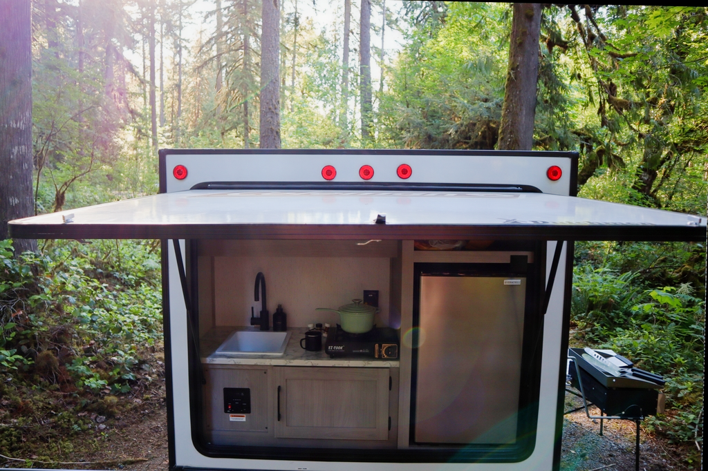 Ivanna and Igor's Coleman Rubicon 1400BH Travel Trailer