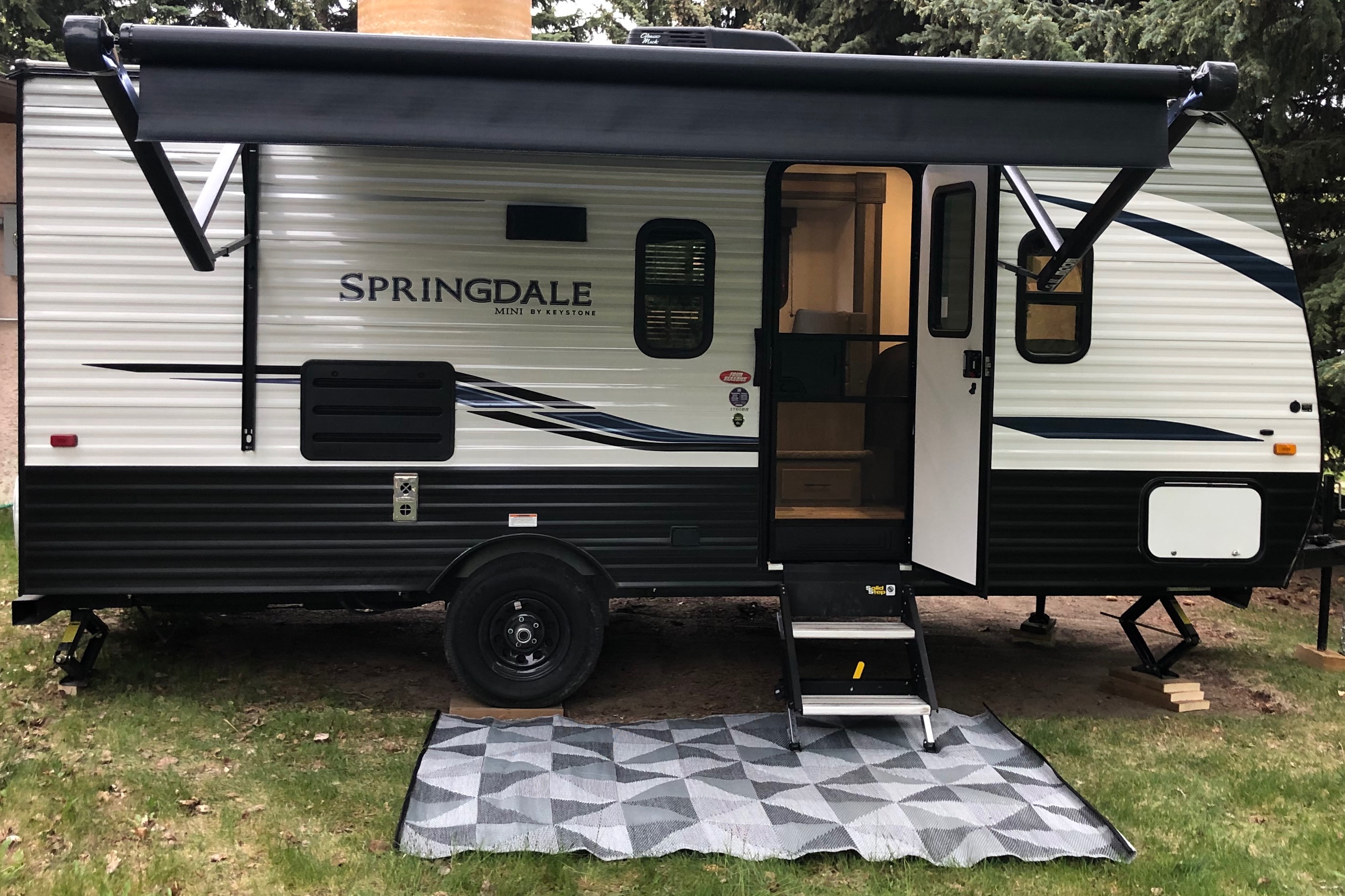 Happy Camper  Keystone Springdale Travel Trailer