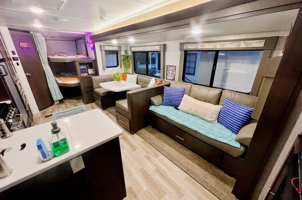 "Little home on wheels" 2020 WILDWOOD with master bedroom and bunks at the rear.