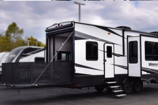 Wanderlust Deluxe Grand Design Momentum G-320 Fifth Wheel