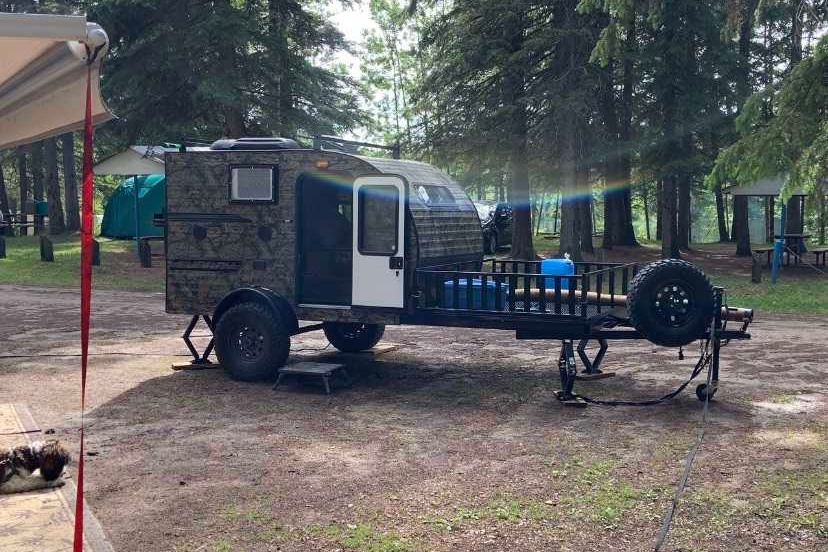 Camo Sunset Park RV Sunray Micro Trailer with toy hauler on front