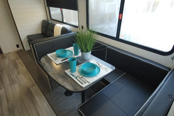 Family travels Heartland Pioneer BH280 Travel Trailer