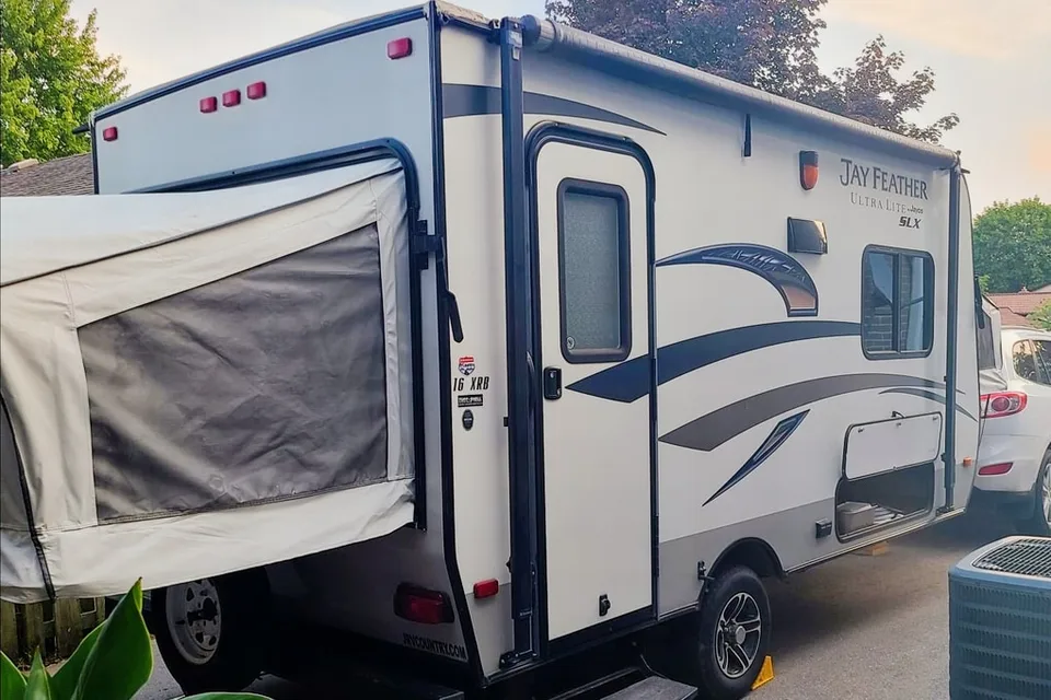 Adams Family Jayco Feather Ultra Lite SLX Hybrid