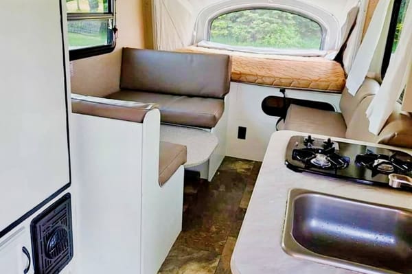 Adams Family Jayco Feather Ultra Lite SLX Hybrid