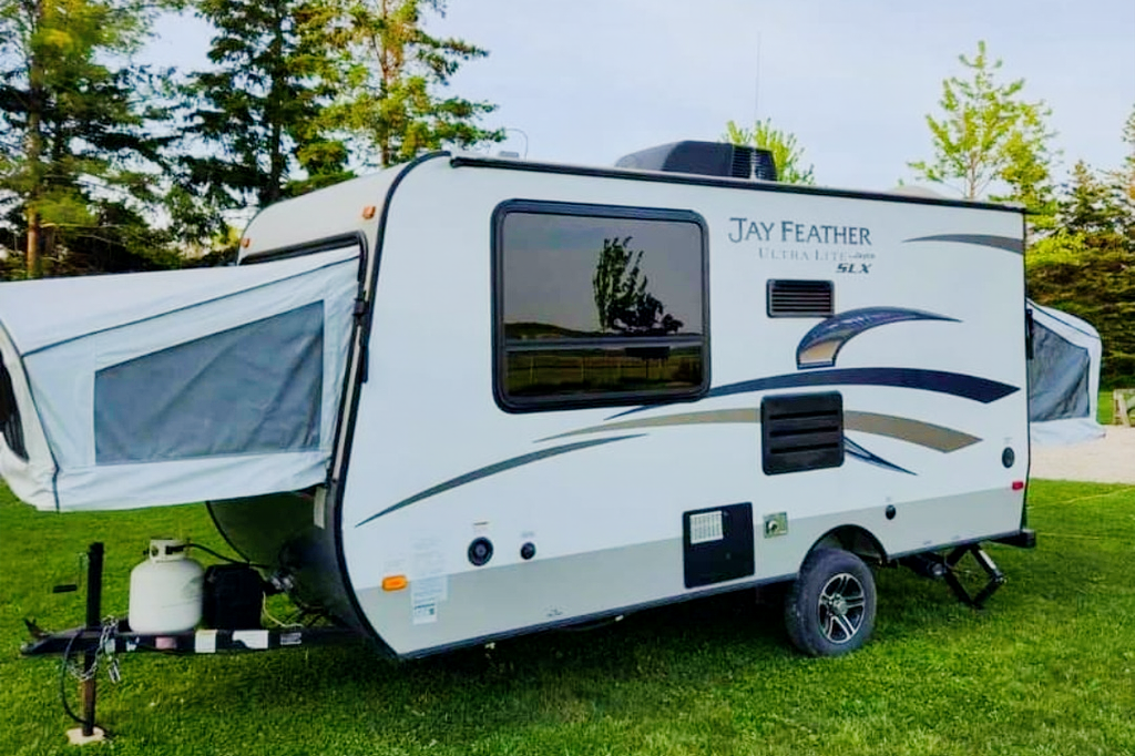 Adams Family Jayco Feather Ultra Lite SLX Hybrid