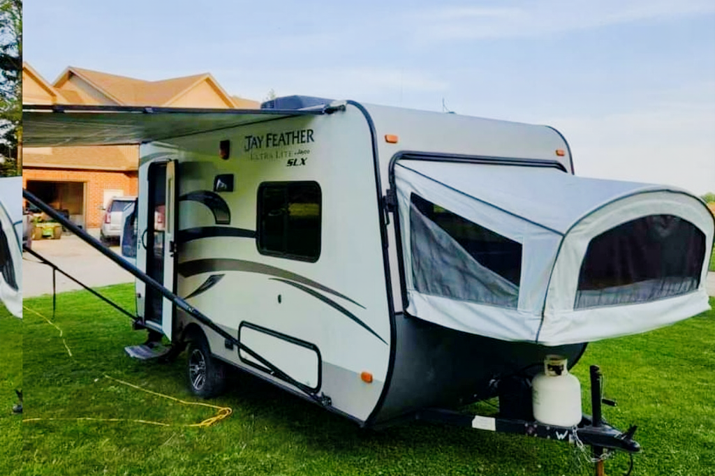 Adams Family Jayco Feather Ultra Lite SLX Hybrid