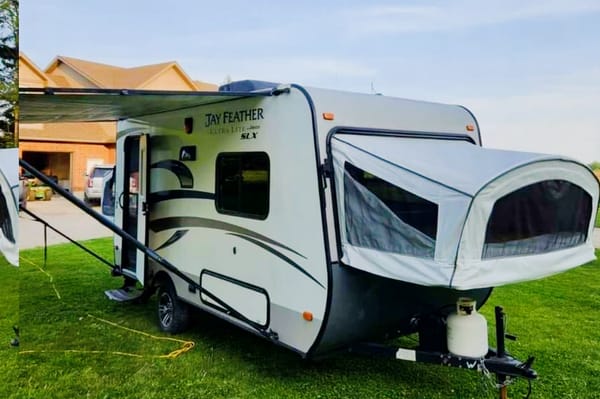Adams Family Jayco Feather Ultra Lite SLX Hybrid