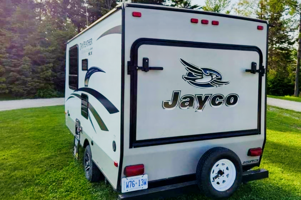 Adams Family Jayco Feather Ultra Lite SLX Hybrid
