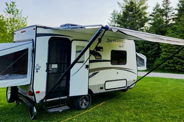 Adams Family Jayco Feather Ultra Lite SLX Hybrid