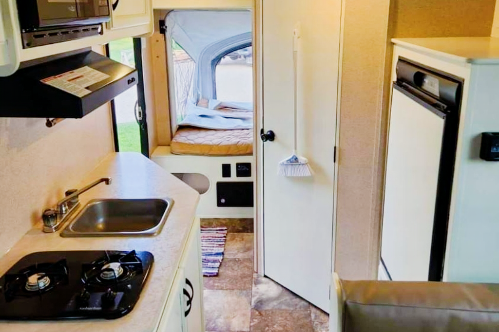 Adams Family Jayco Feather Ultra Lite SLX Hybrid