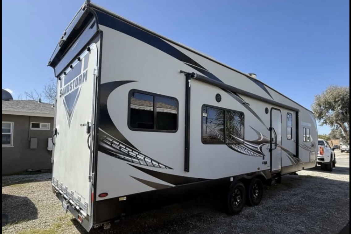 Raymond's Forest River Sandstorm 282SLR Toy Hauler