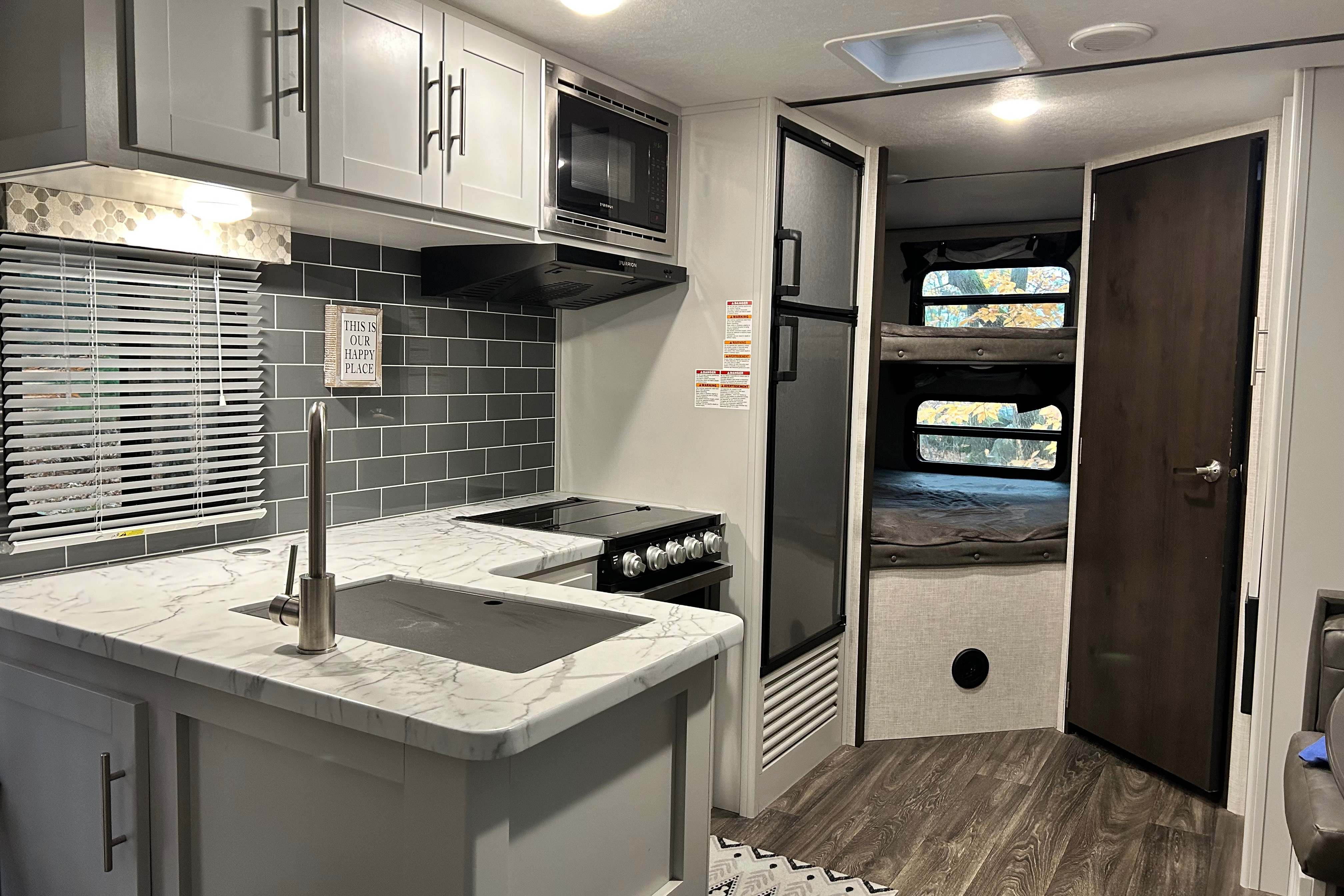 “Our Happy Place” Keystone Bullet Travel Trailer
