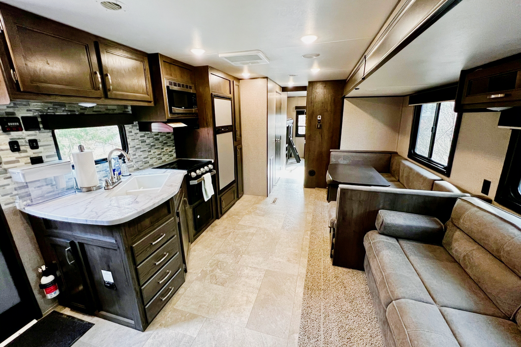 Premier Oasis' Fully Stocked Bunkhouse RV - Book Your Adventure!