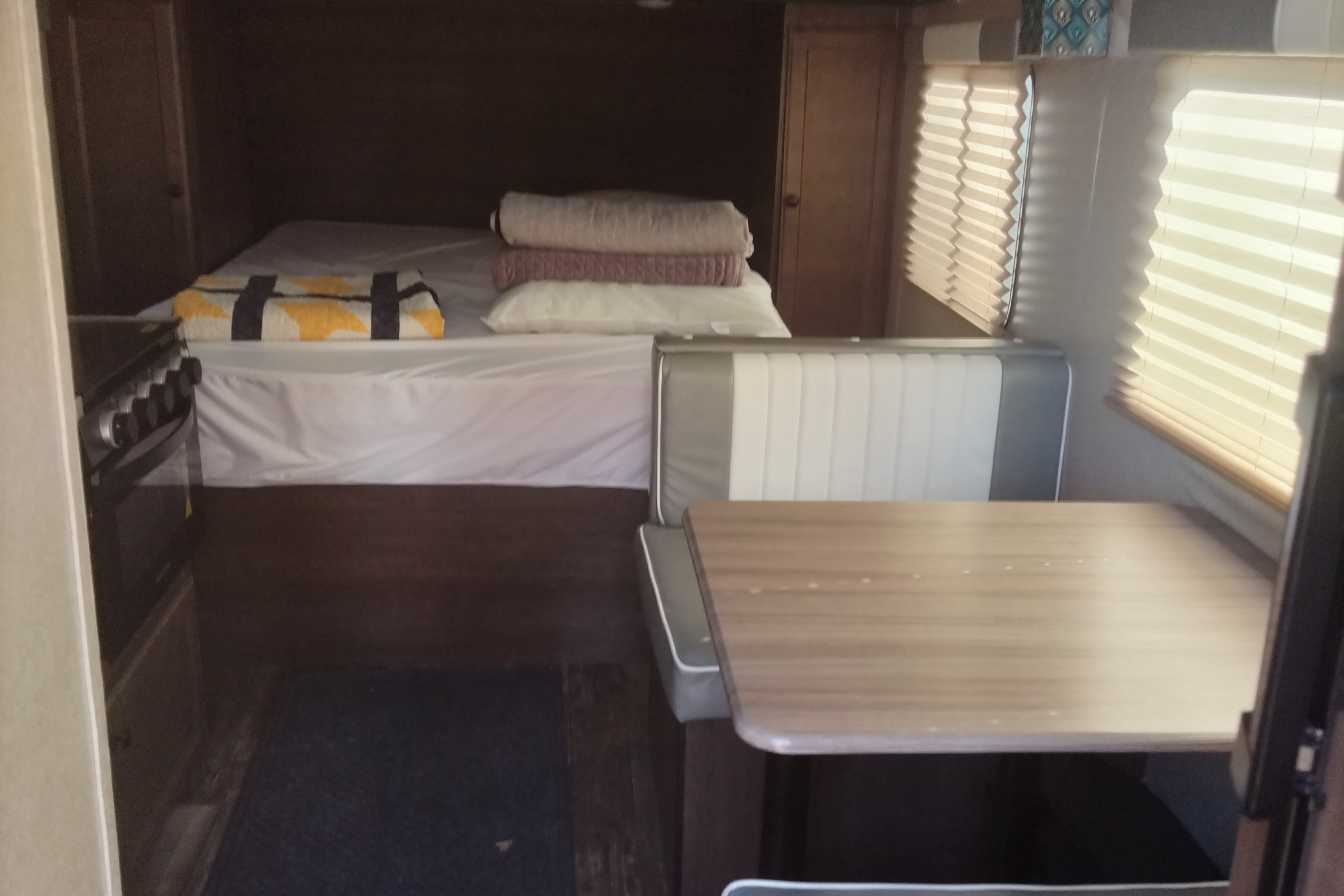 Singles, Couples, Small Family. Queen Bed plus room for littles! Delivery!