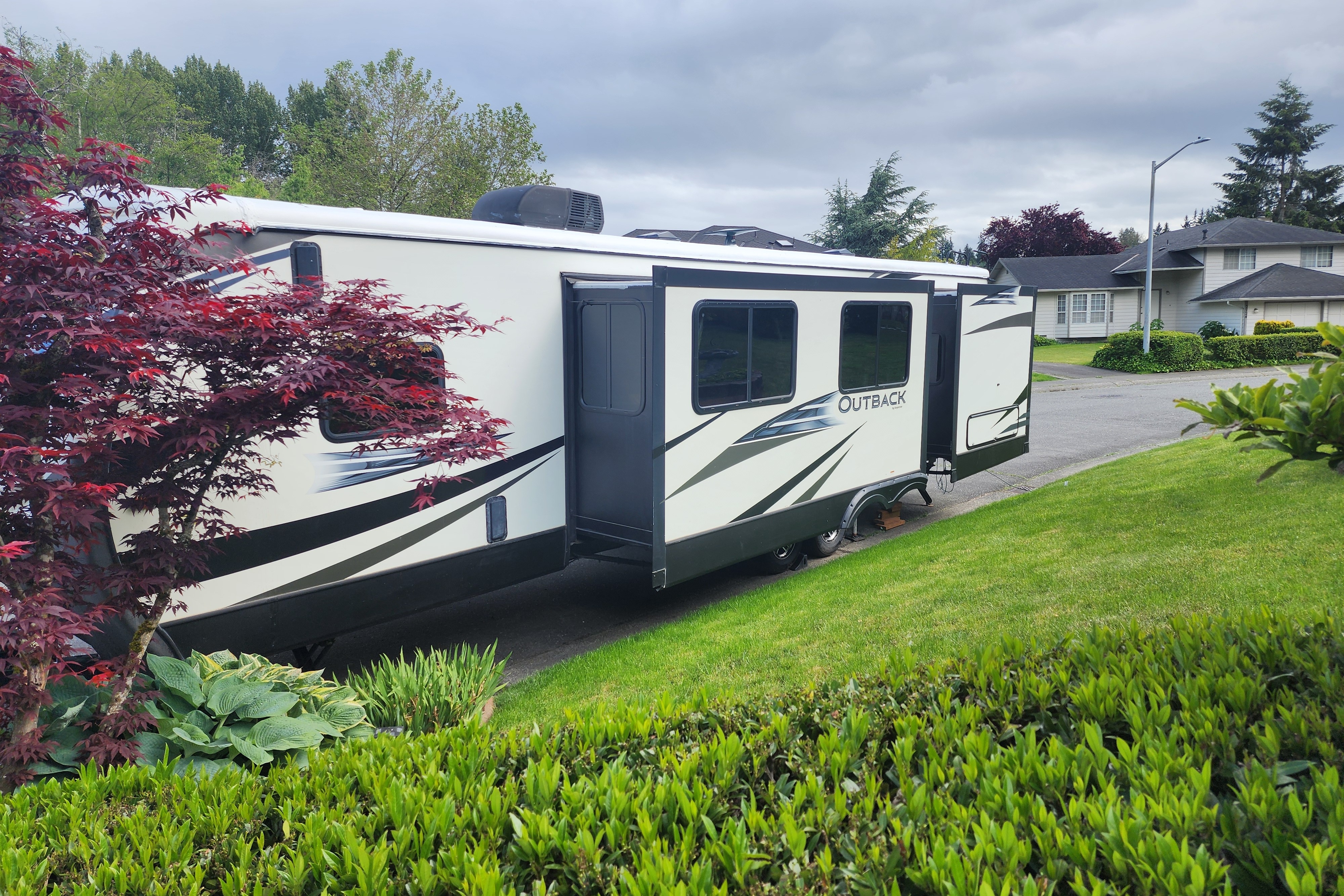 Wanderlust 38' Keystone Outback Toy Hauler Travel Trailer