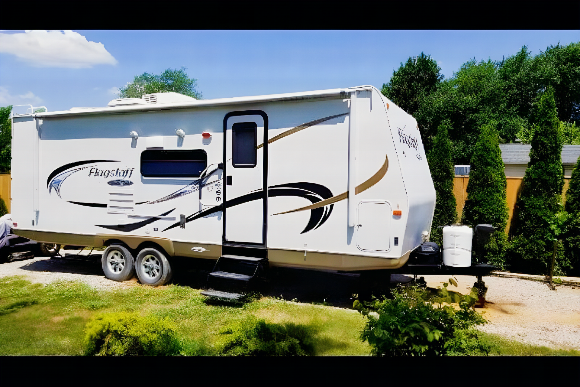 Jessica's 25’ Flagstaff  Trailer with large slide and bunk