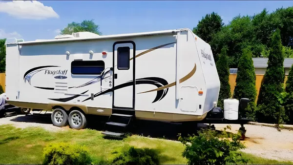 Jessica's 25’ Flagstaff Trailer with large slide and bunk